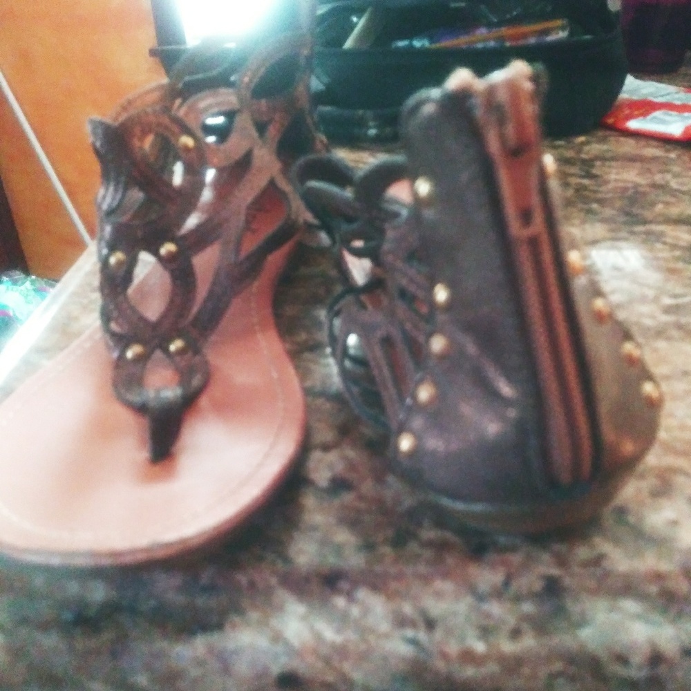 Gently used gold Brown zip-up strappy sandal
